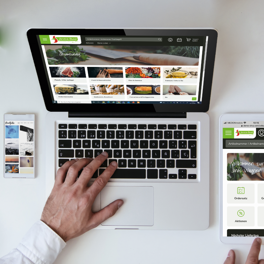 Computer und Tablet mit geöffnetem Webshop